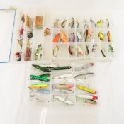 Fishing lures in plastic trays