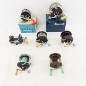 7 Vintage Penn Fishing Reels, 2 with boxes