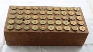 Wood Block w/ 12 Gauge Shotgun Shells empty