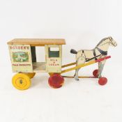 Rich Toys painted wood and tin Borden's milk wagon