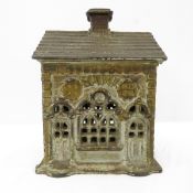 Antique cast iron coin bank, bank building