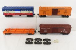 Vintage Lionel box cars & flat car