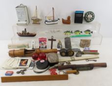 Glass ship in bottle, bottle corker, slide rule