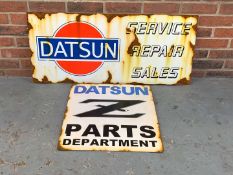 Two Metal Datsun Signs