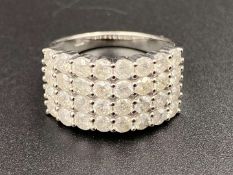 A four row, claw set, brilliant cut diamond, 10ct white gold ring, approx 2.5ct.