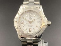 TAG-HEUER, “Professional”, stainless steel ladies wristwatch. WN1311, AM0960