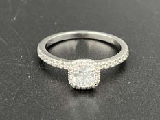18ct white gold ring with multi diamond setting.