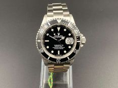 ROLEX, “Submariner”, stainless steel,wristwatch. Ref 16610, Serial Number P575641, 2000.