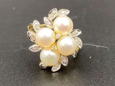 A cultured pearl and diamond set, 9ct yellow and white gold, cluster ring
