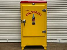 FRIGIDAIRE, a 1940s American upright refrigerator, repainted in “Royal Crown Cola” livery
