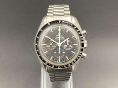 OMEGA. Speedmaster, Moonwatch, stainless steel, two button chronograph, ST145.022. c 1971.