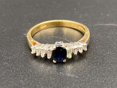 A Sapphire & Diamond18ct gold ring.