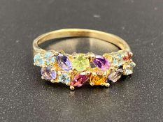 A multi stone set, Round & Marquise cut, 9ct yellow gold ring.