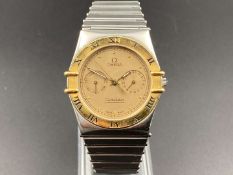 OMEGA, “Constellation” a stainless steel, quartz wristwatch with day/date.