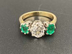 A Diamond & Emerald 3 stone 18ct gold ring