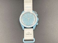 SWATCH Moonswatch “Mission to Uranus” bioceramic two button quartz chronograph watch