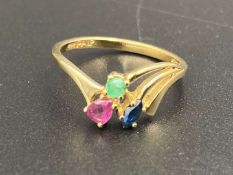 An Emerald Ruby & Sapphire 9ct gold ring