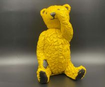 A modern cast resin model of a Teddy Bear, “All proceeds to charity”