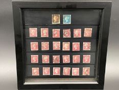 A framed Victorian stamp collection
