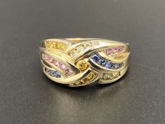 A multi Sapphire 9ct gold ring