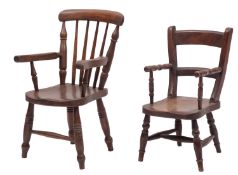 A child's stained hardwood elbow chair,