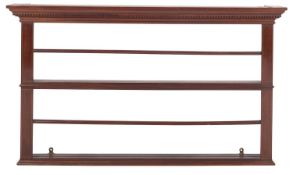 A mahogany and line inlaid plate rack in George III taste,