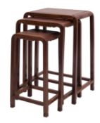 A nest of three Chinese huanghuali occasional tables,