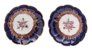 Two First Period Worcester lobed dishes each painted with a central spray of flowers within a