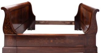A rosewood and marquetry lit en bateau,