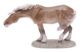 A Royal Copenhagen figure 'Windswept Horse' modelled by Lauritz Jensen, on mound base,