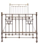 A Victorian painted iron, brass and porcelain mounted double bed,