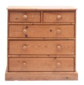 A pine chest of drawers in 19th century style, 20th century; the top with moulded edges,