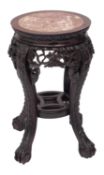 A Chinese carved hardwood and marble inset stand,