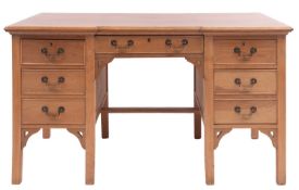 A 20th-century oak pedestal desk;