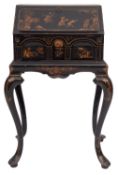 A black lacquered and Chinoiserie decorated wood bureau on stand in Queen Anne style,