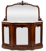 A Victorian walnut serpentine fronted chiffonier;