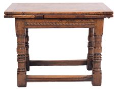 An oak draw leaf table in 17th century taste,