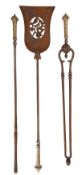 A set of steel and brass mounted fire irons, second quarter 19th century; comprising shovel,