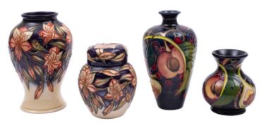 Four pieces of John Moorcroft pottery,