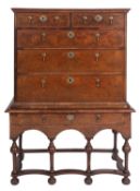 A George II walnut chest on stand,