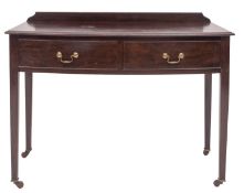 A Victorian mahogany wash table in George III style, circa 1880; bow fronted,