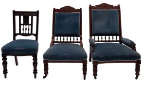 A pair of Victorian mahogany & upholstered lounge chairs,