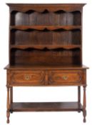 An oak dresser in early 18th century taste,