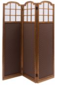 A giltwood, glazed and fabric lined three fold room screen, in Louis XVI taste,