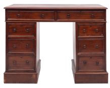 A mahogany pedestal desk,