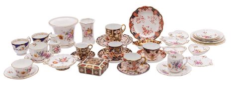 A collection of Royal Crown Derby porcelain, comprising tea wares, a vase, strainer,