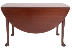 A late George II /early George III mahogany drop leaf dining table,