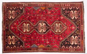 A Qashgai carpet, the rose field with triple hexagonal stepped central medallions,