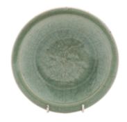 A Chinese Longquan dish with crackled celadon glaze, everted rim and on short foot,