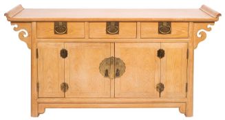 An American bleached oak sideboard, by Raymond K.